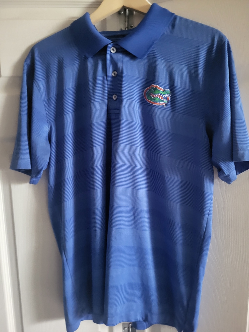 Knights Apparel Royal Blue Striped Polo with Embroidered Gator Patch